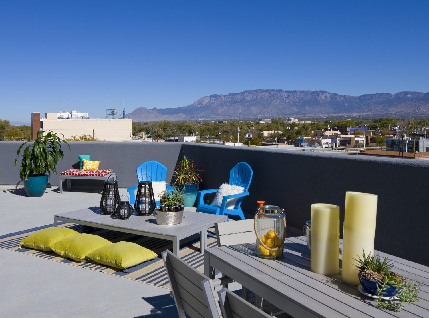 Rooftop deck seating with Sandia Mountain views