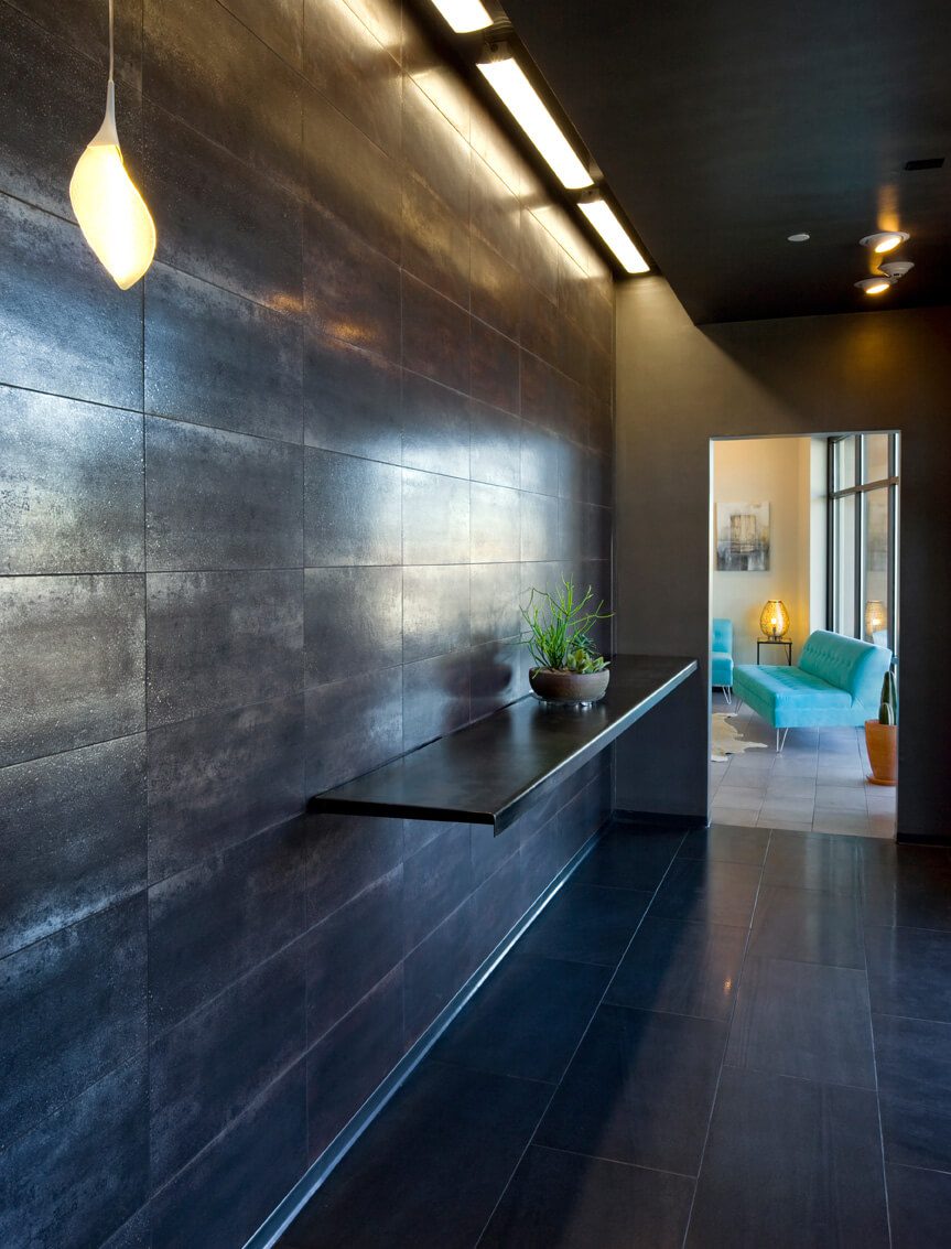 Lobby hallway with dark accent wall