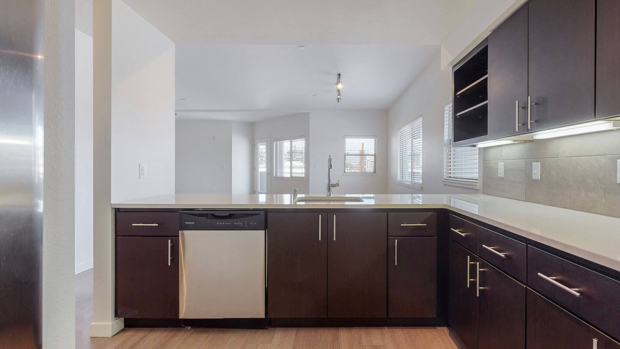 Modern kitchen with dark cabinetry
