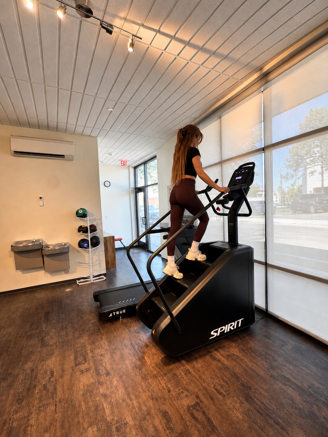 Resident on the stair climber in the new fitness center