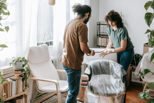 couple decorating apartment
